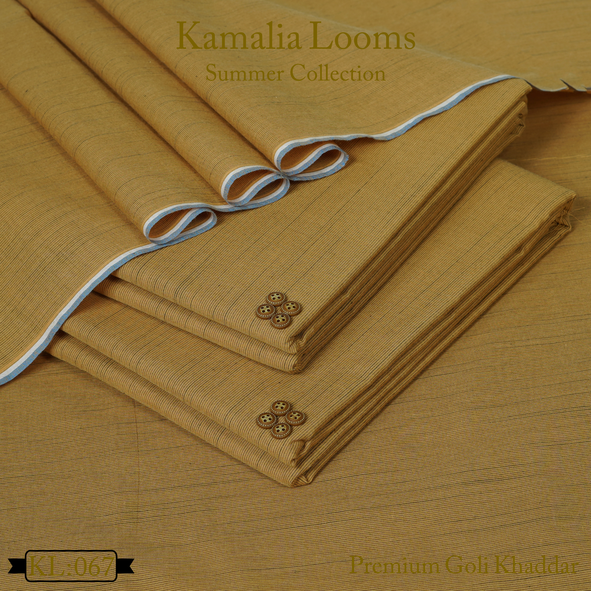 Kamalia Looms premium summer goli khaddar fabric in mustard yellow neatly folded with decorative buttons